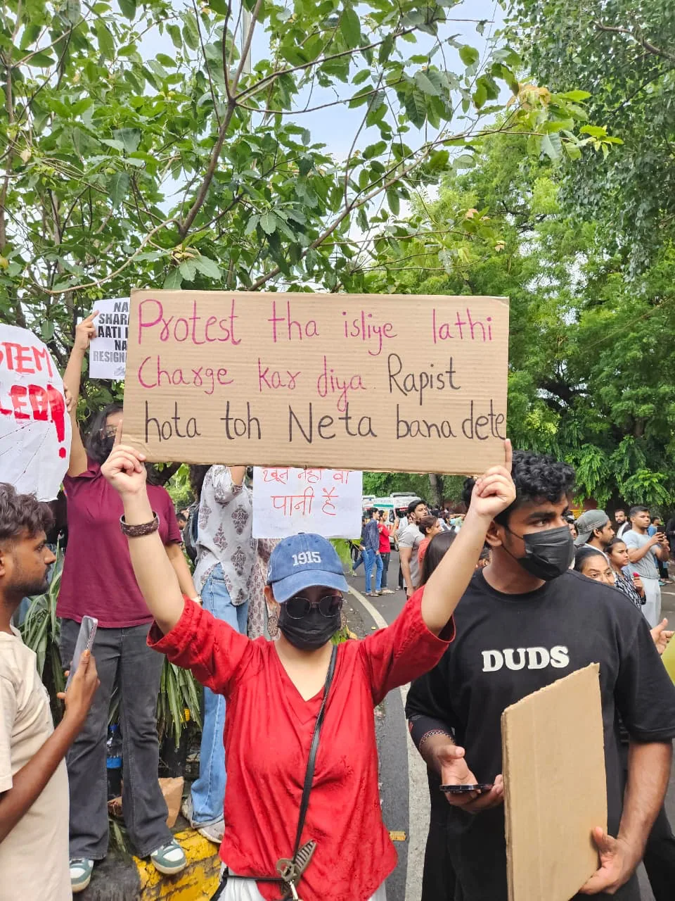 Placard condemning force against protesters