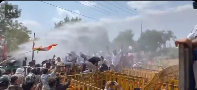 Water spray at police barricades